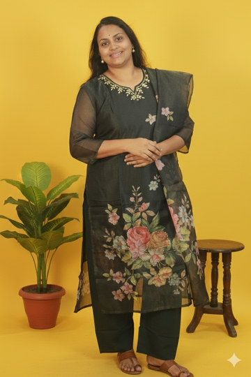 Shraddha enchanting deep green floral tissue shimmer set